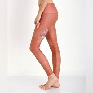 Teeki women’s yoga Leggings in Rust with Bull Skull Design